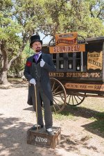 481px-Snake-oil_salesman_Professor_Thaddeus_Schmidlap_at_Enchanted_Springs_Ranch,_Boerne,_Texa...jpg