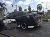 2016-Toyota-Prius-test-mule-rear-three-quarters-left.jpg